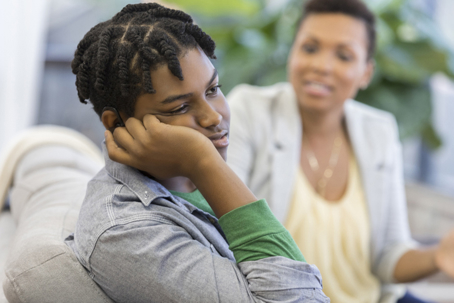 upset teen ignoring mother
