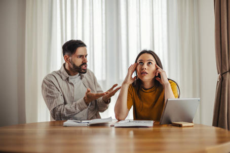 couple arguing over documents